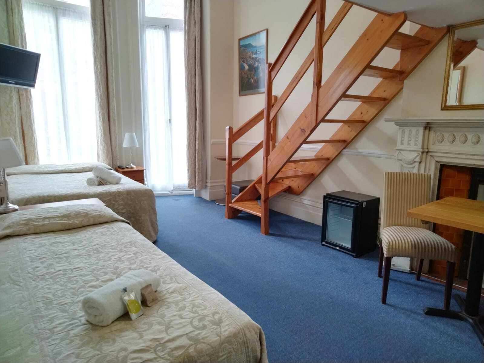 Mezzanine, Family, Suite, 1 Double and 3 Single Beds, Balcony