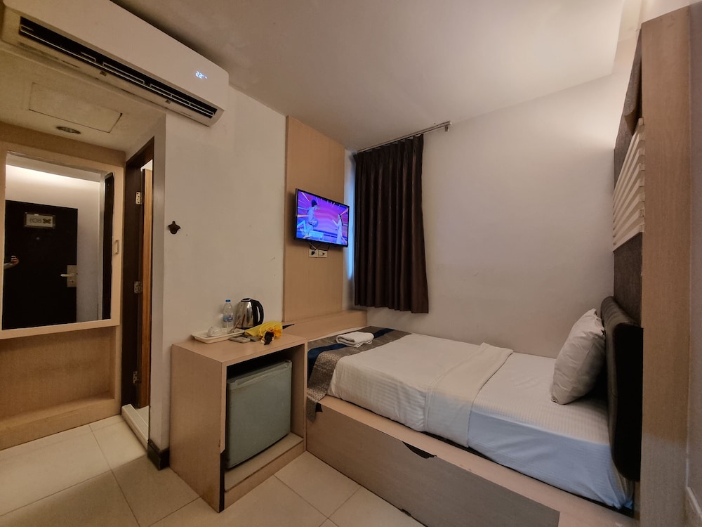 غرفة قياسية مفردة بسرير فردي