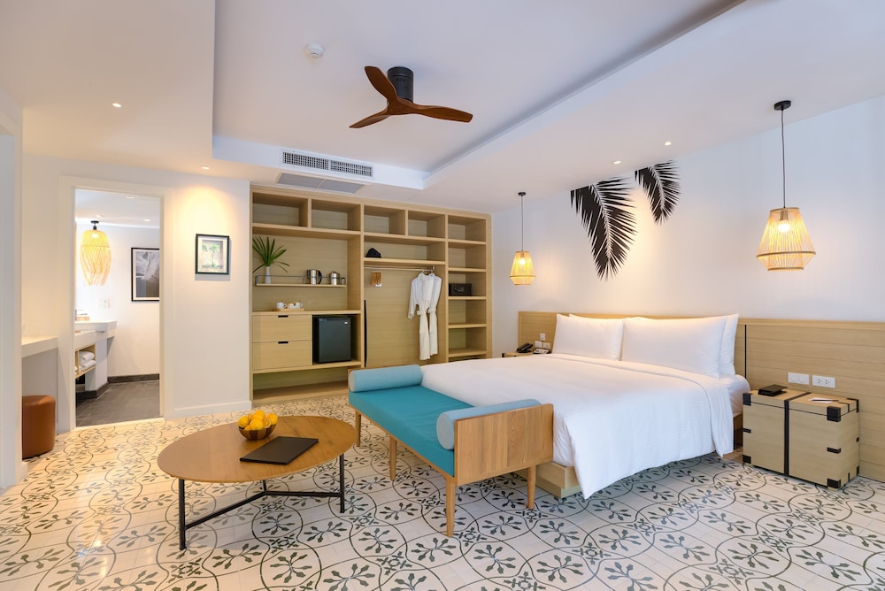 Outrigger Surin Beach Resort 9/74
