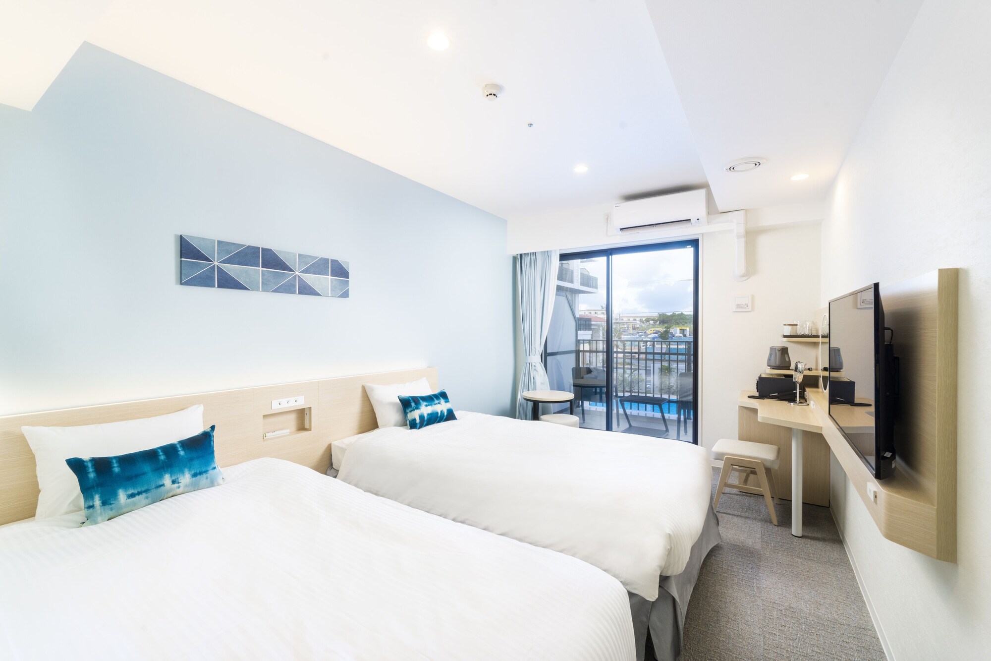 غرفة سوبيريور بسريرين منفصلين مع سرير سحّاب إضافي