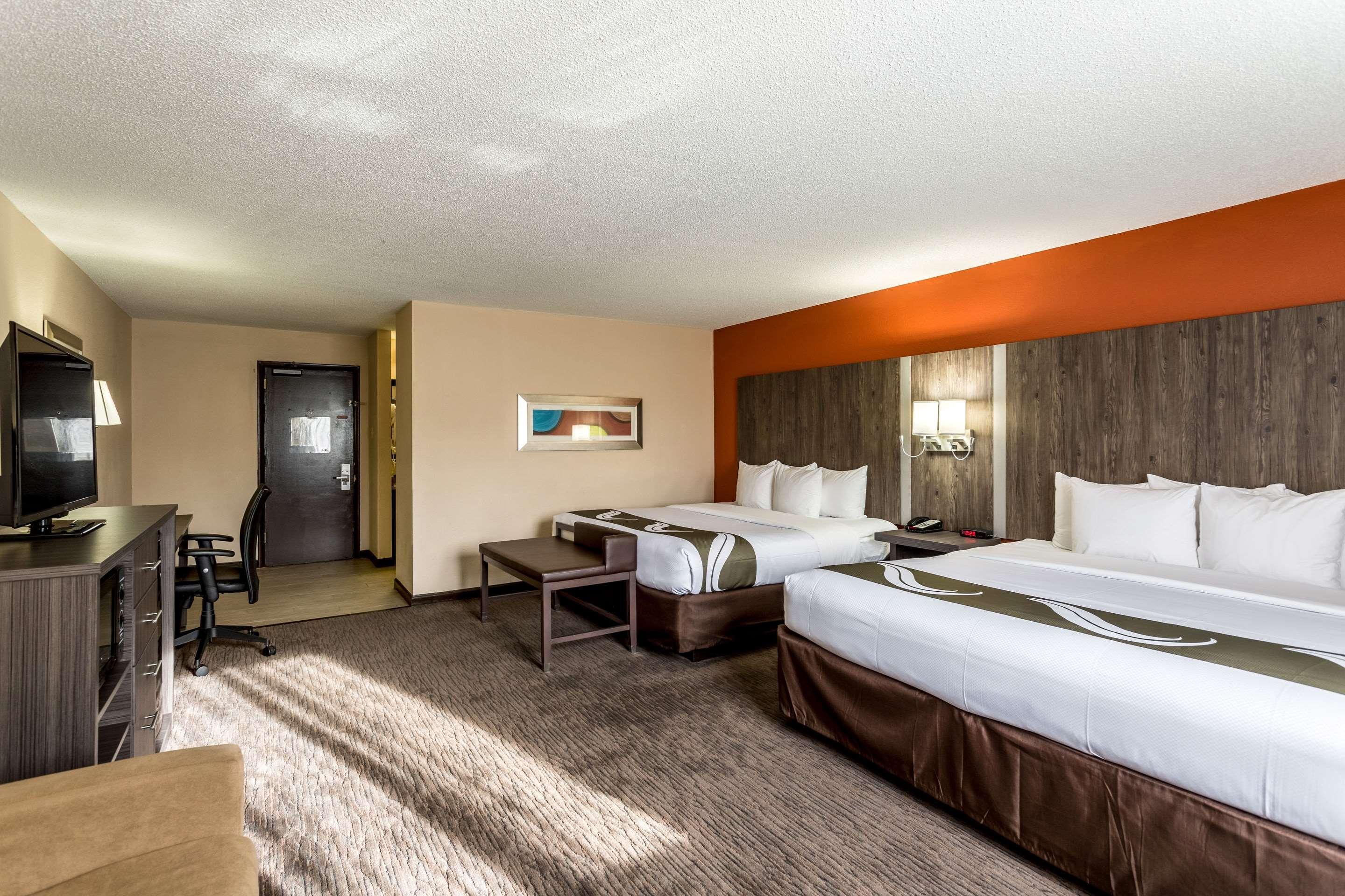 SUITE, 1 KING AND 2 QUEEN BEDS