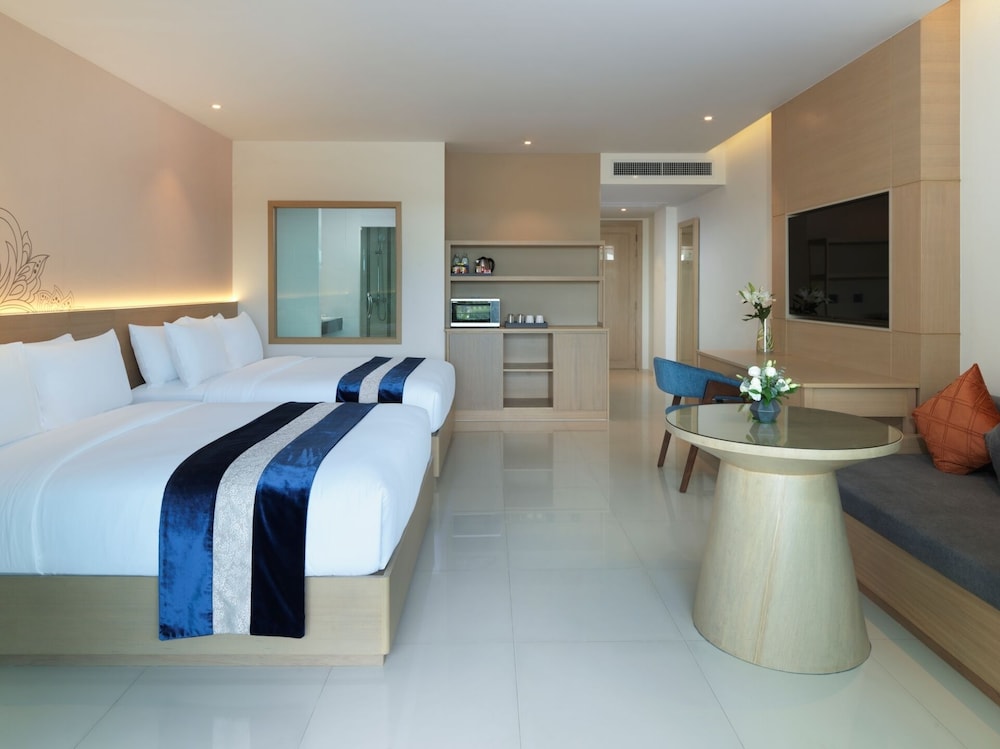 غرفة غراند بسريرين كوين بإطلالة على الحديقة، Chanalai Flora Resort 5/7