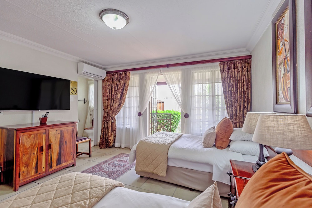 Afrique Boutique Hotel O.R. Tambo 30/50