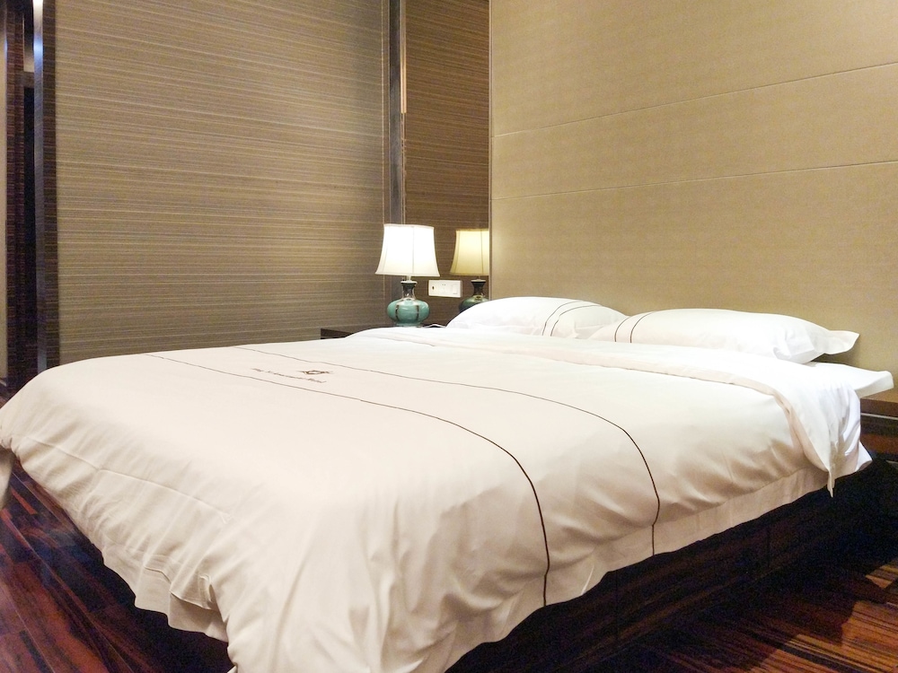 Xingyi International Hotel Poly Store 25/70