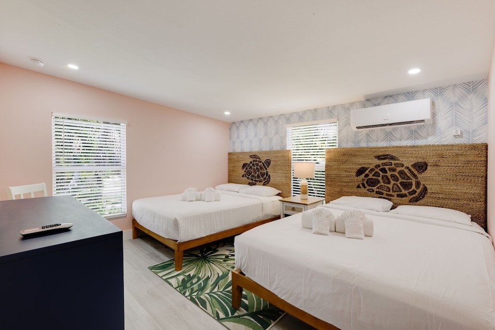 THE Palmview AND Sandpiper Inns 25/64