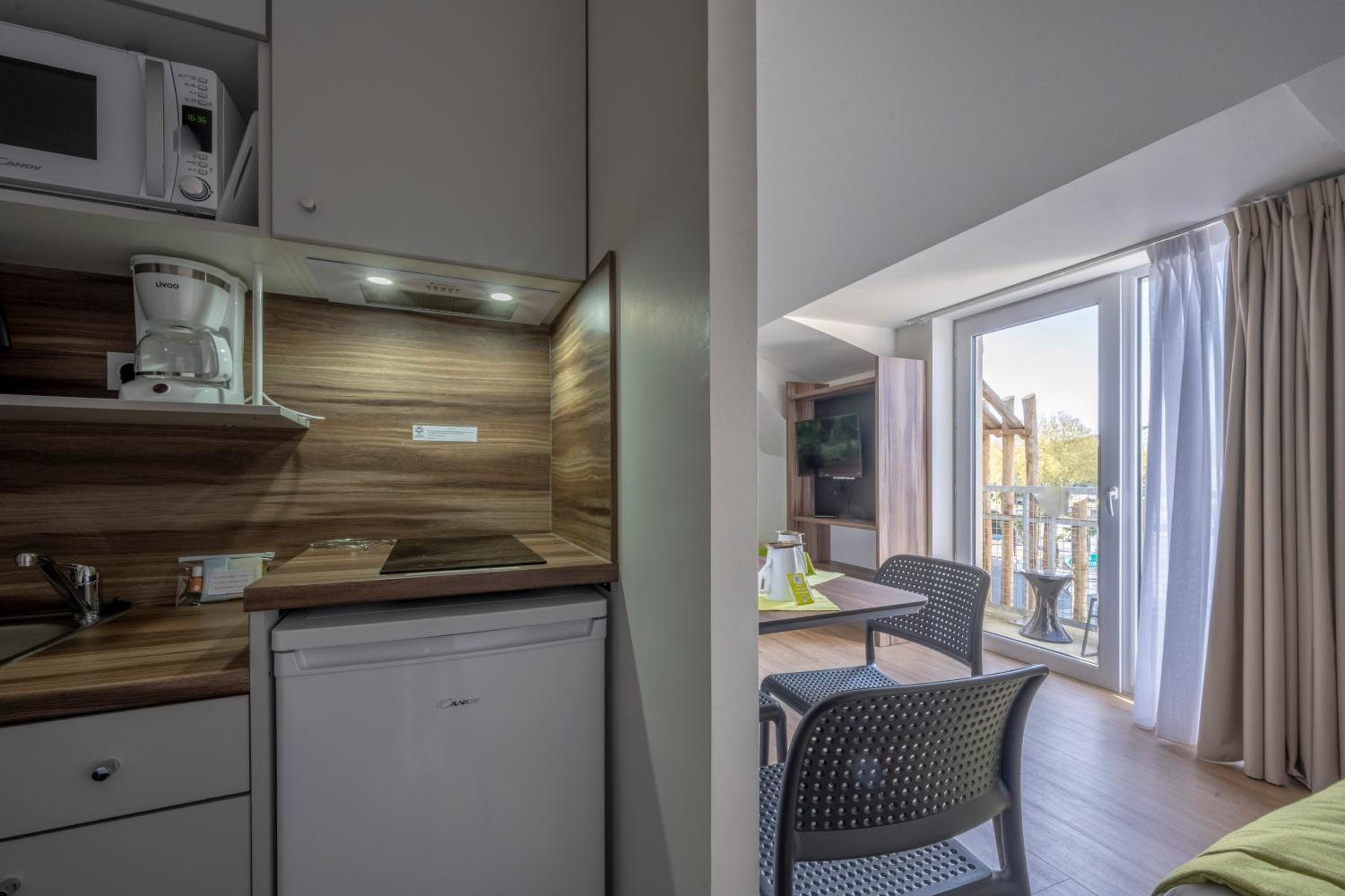 ATHOME RESIDENCE ET SPA 40/40
