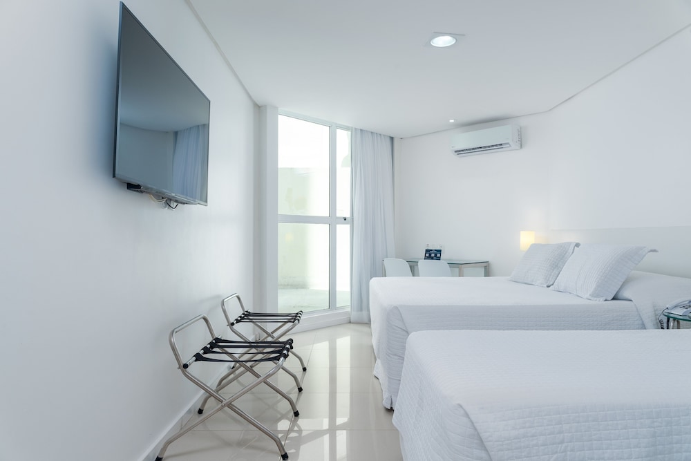 غرفة بريميوم عائلية بسرير كوين وسريرين منفصلين، Hotel Brisa Praia 3/4