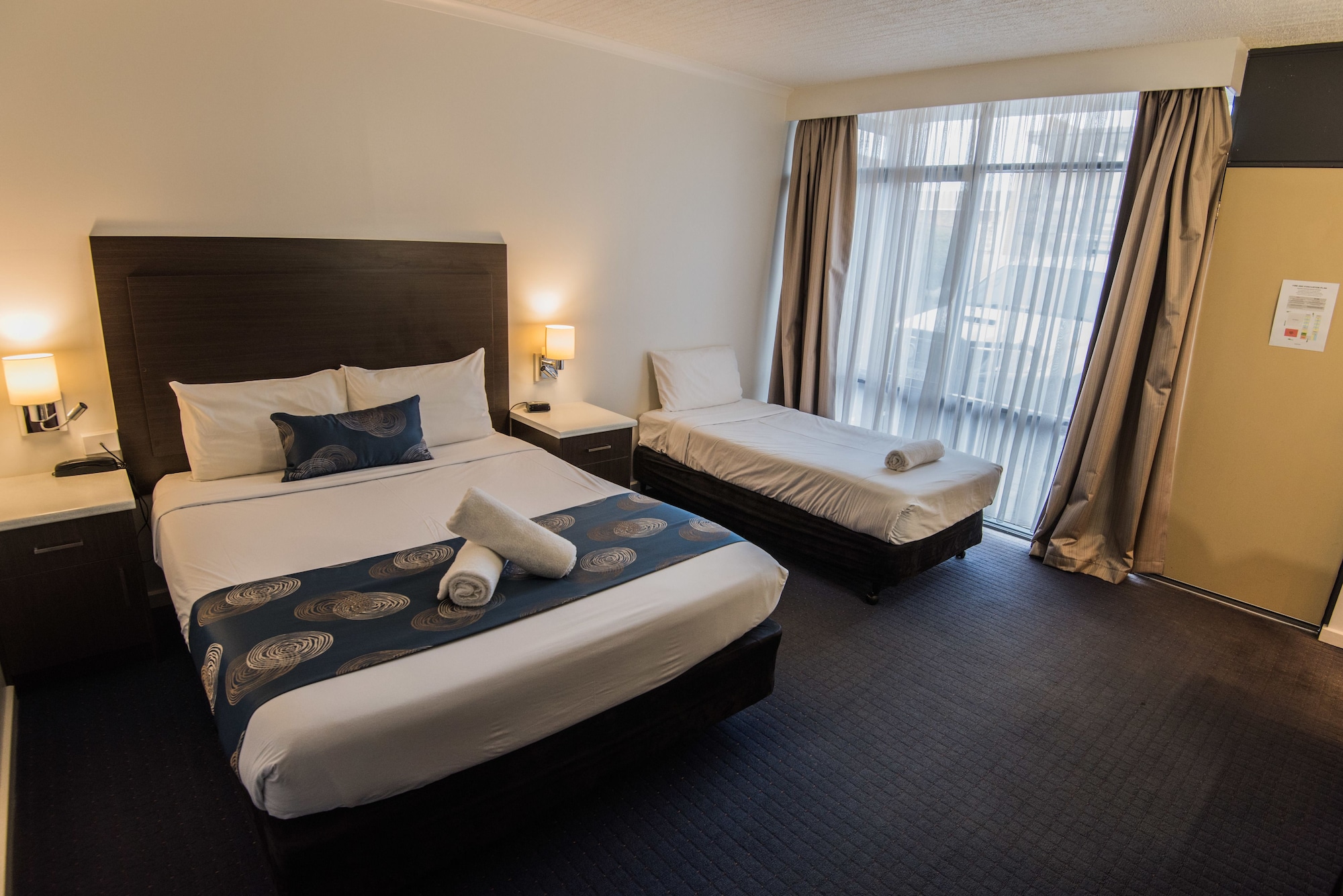 Deluxe, 1 Queen and 1 Single Bed