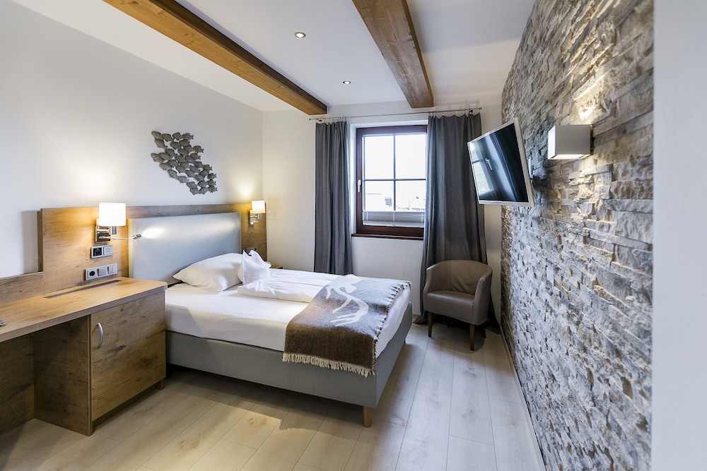 غرفة مفردة بسرير فردي