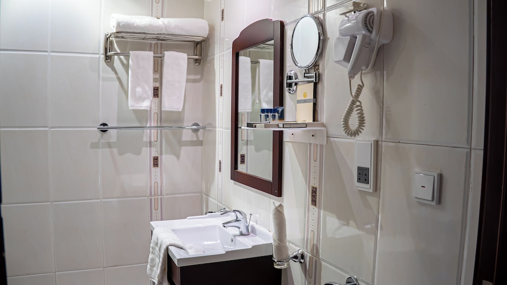 غرفة قياسية رباعية بأربعة أسرّة، ابراج الريان المكية(Al Rayyan Makiya Towers Hotel) 9/9