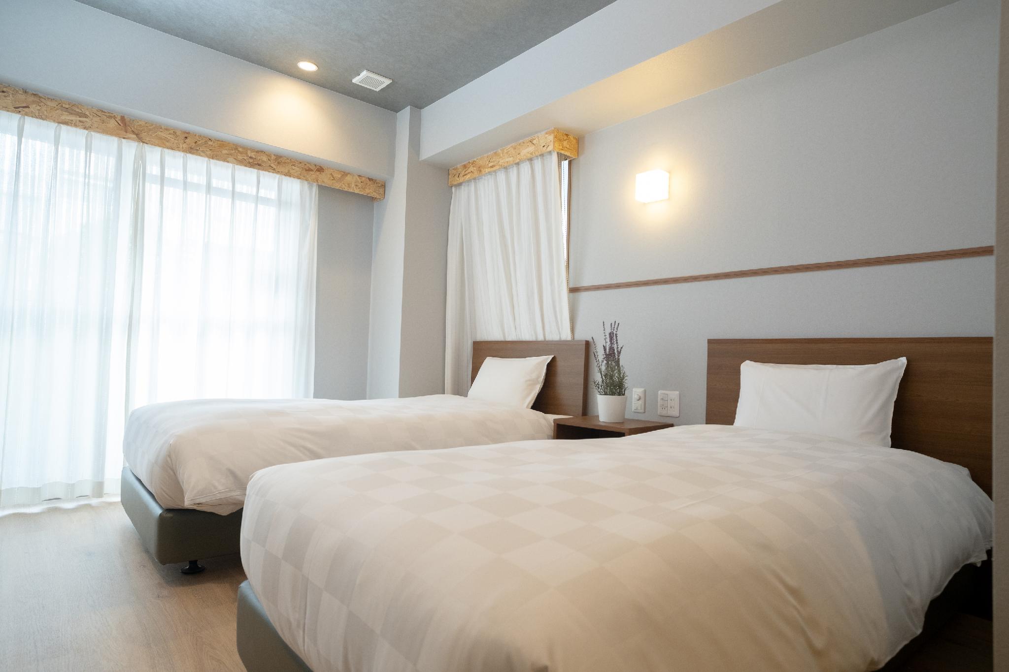 Semi Room, Essential, 2 Semi Double Beds