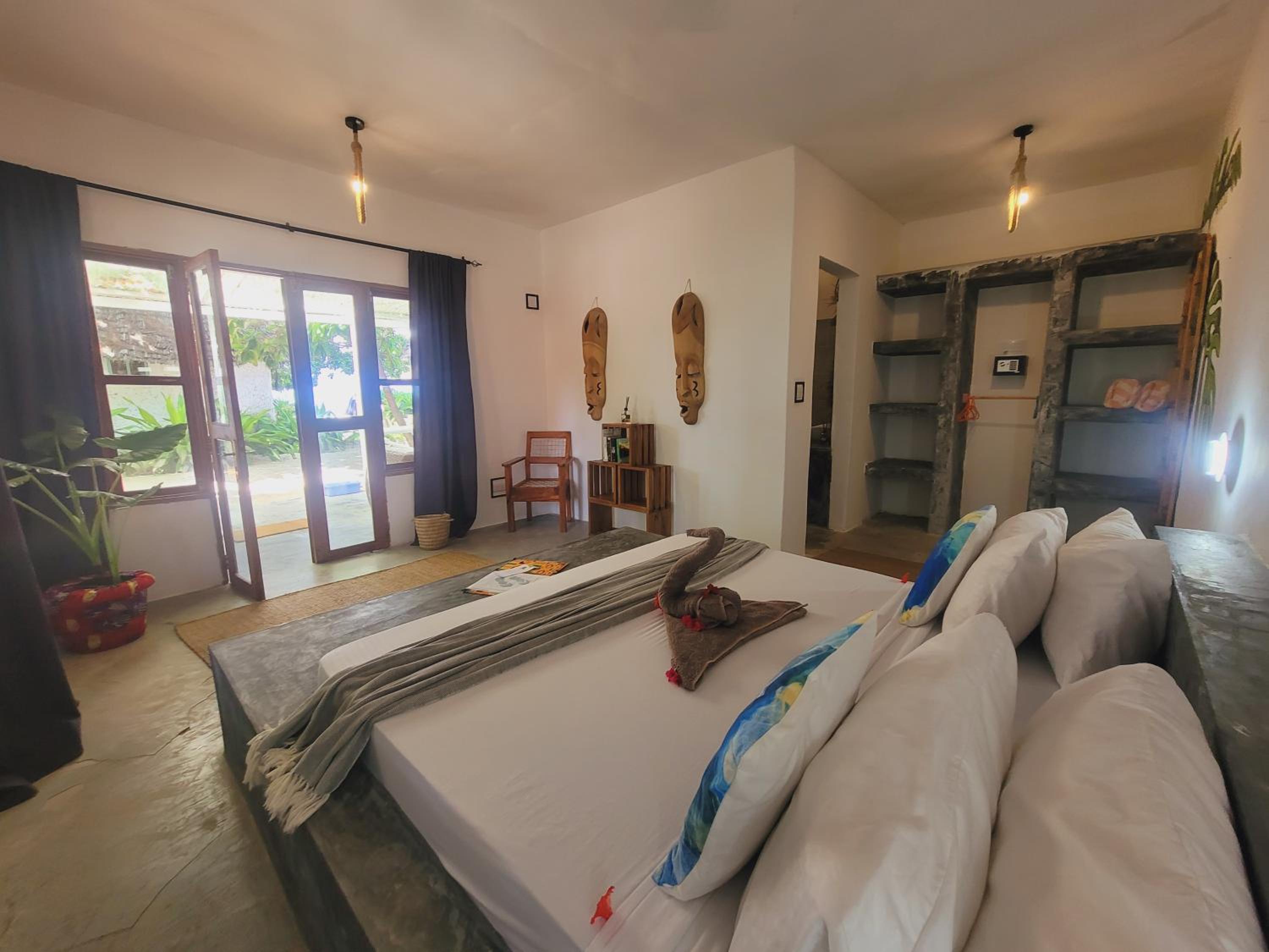 غرفة ديلوكس بسرير مزدوج بشرفة، Garden Beach Bungalows 2/10