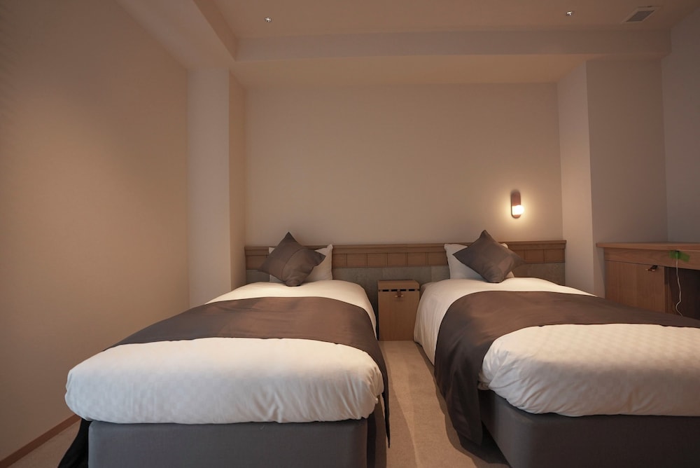 DELUXE, TWIN BEDS