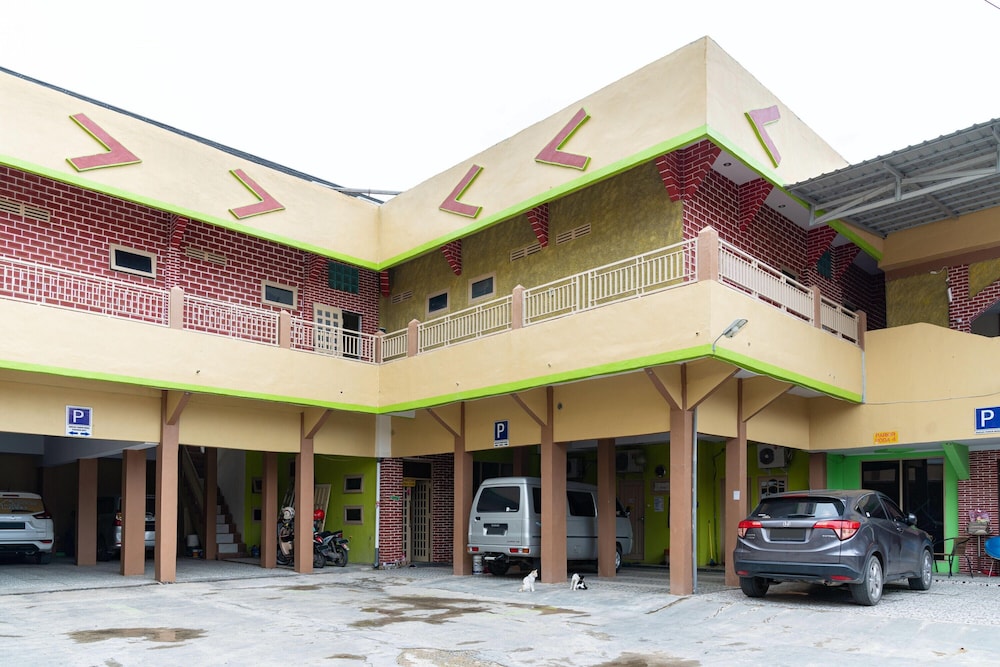 Reddoorz Syariah Near Jalan A Yani Km 8 Citraland 4/26