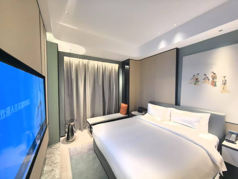 جناح عائلي بسرير مزدوج وسرير فردي، Novotel Shanghai Wanyuan 2/7