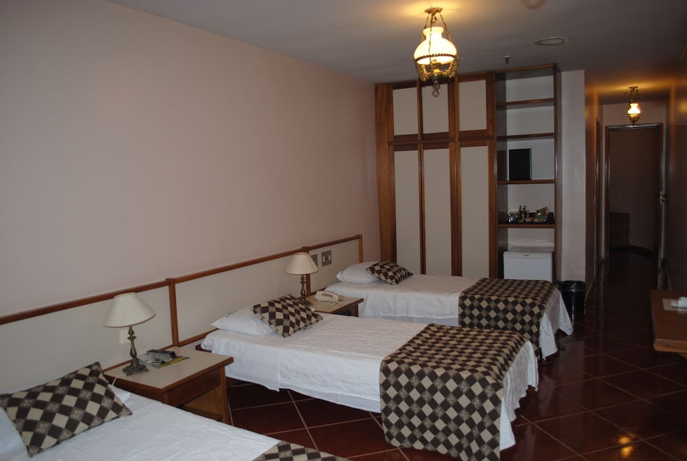 غرفة عائلية رباعية بسرير مزدوج وسريرين منفصلين، Rondonia Palace Hotel 3/6