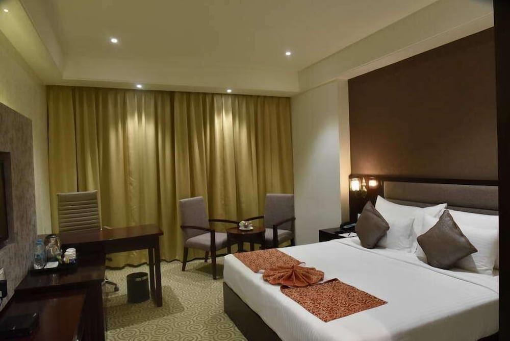 غرفة ديلوكس بسرير كينج، Pride Hotel And Convention Centre 5/10