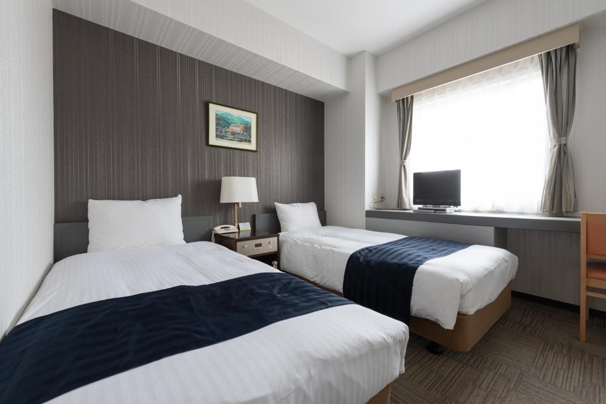 غرفة بسرير مزدوج في الملحق للمدخنين، Tottori City Hotel 2/2