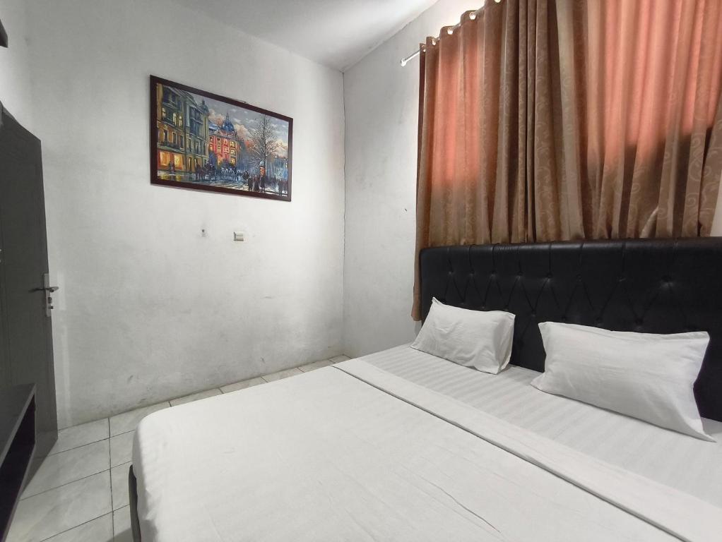 Room at Hotel O near Mall Boemi Kedaton formerly House Of Tuwuh 2, BANDAR LAMPUNG