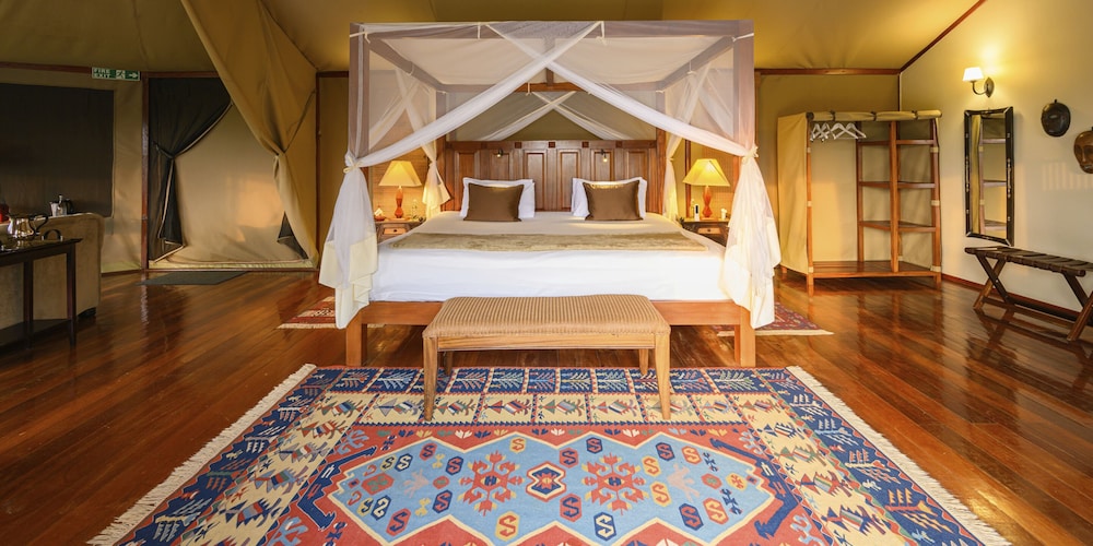 OLARE MARA KEMPINSKI MASAI MARA 15/50