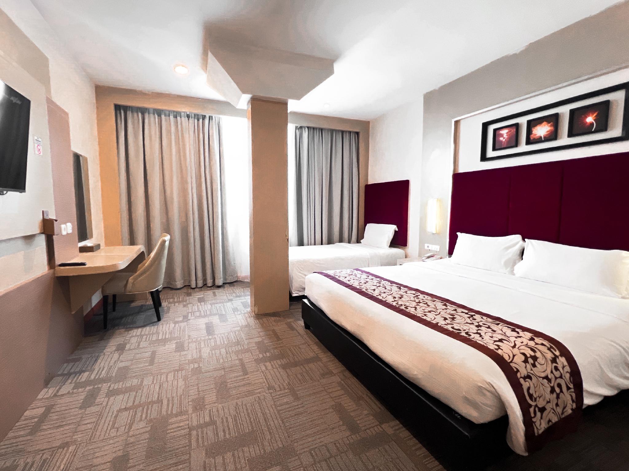 جناح جونيور بسرير مزدوج وسرير فردي، Batam City Hotel 2/2