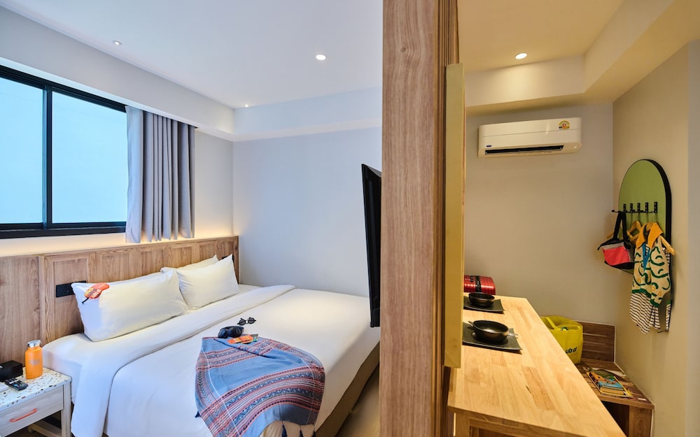 The Triplex Deluxe Triple Room