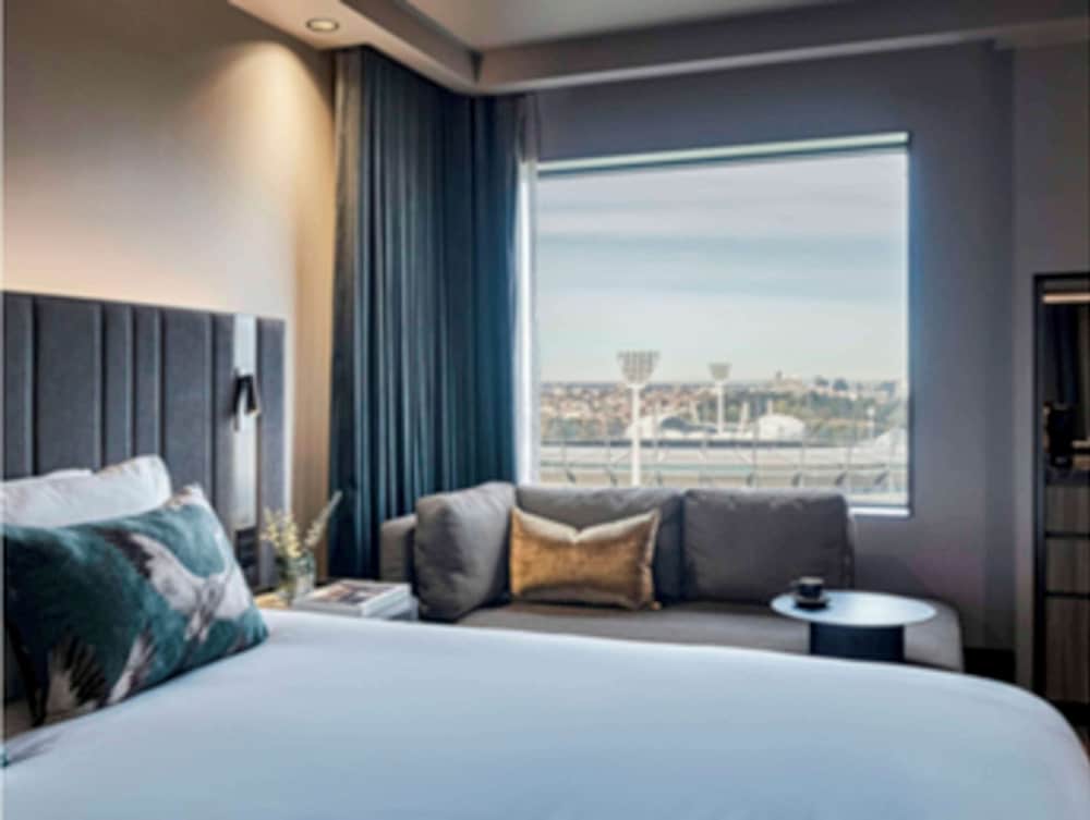 غرفة ديلوكس تنفيذية بسرير كينج مع دخول صالة النادي في طابق مرتفع، Pullman East Melbourne 5/10