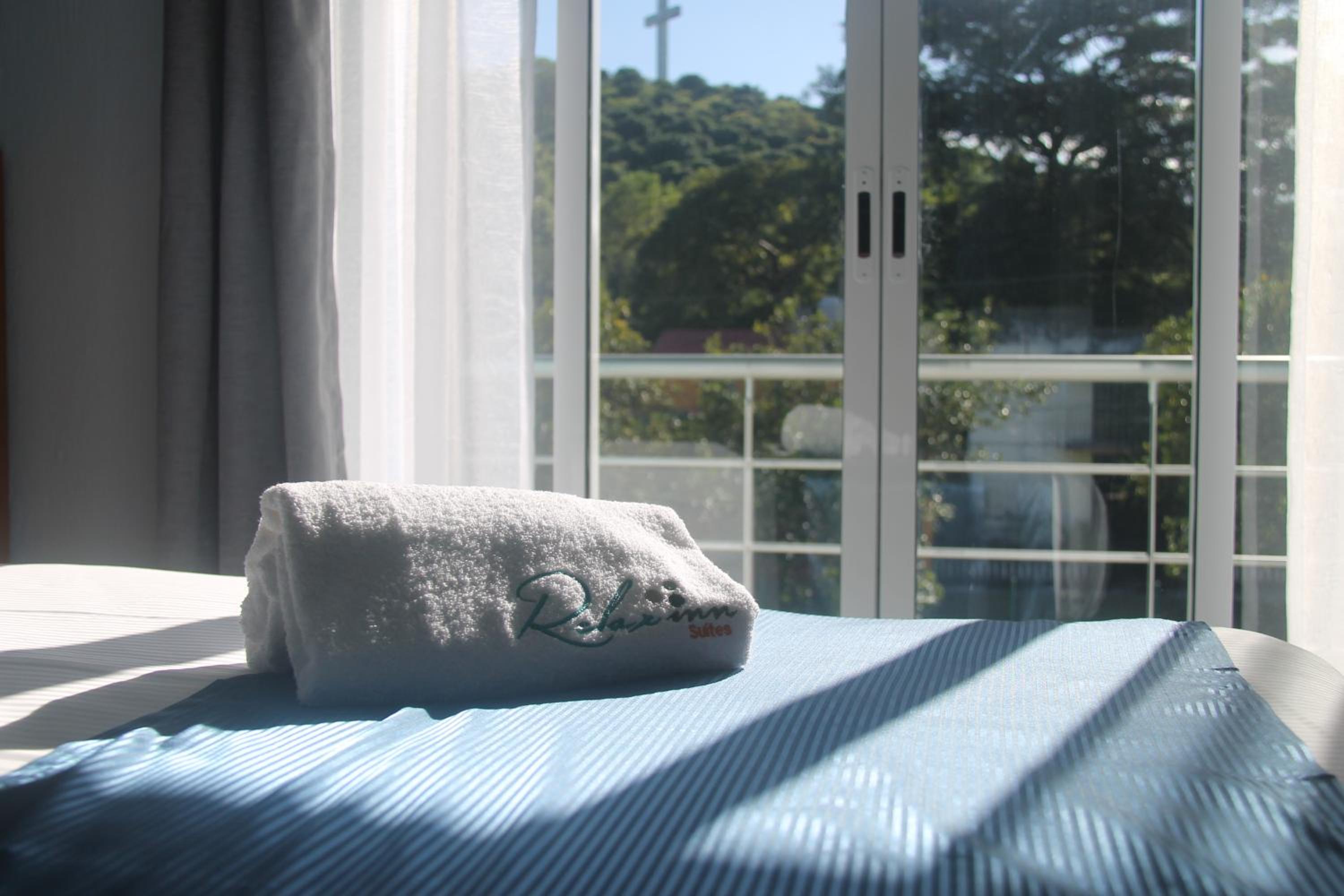 Relax Inn Suites 15/50