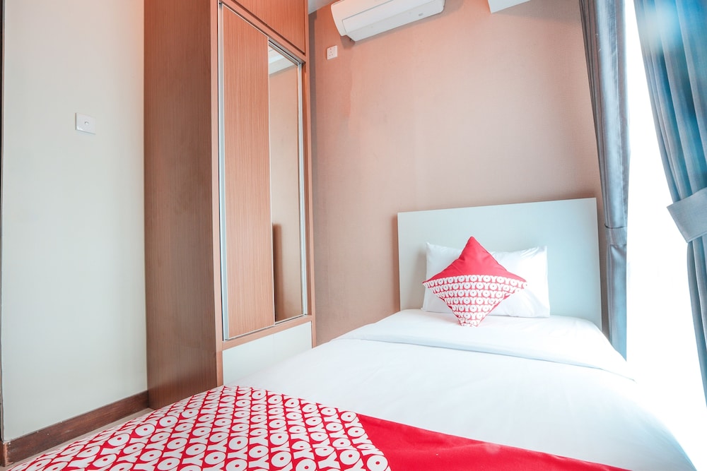 OYO Flagship 755 Appartel Grand Dhika City 13/39