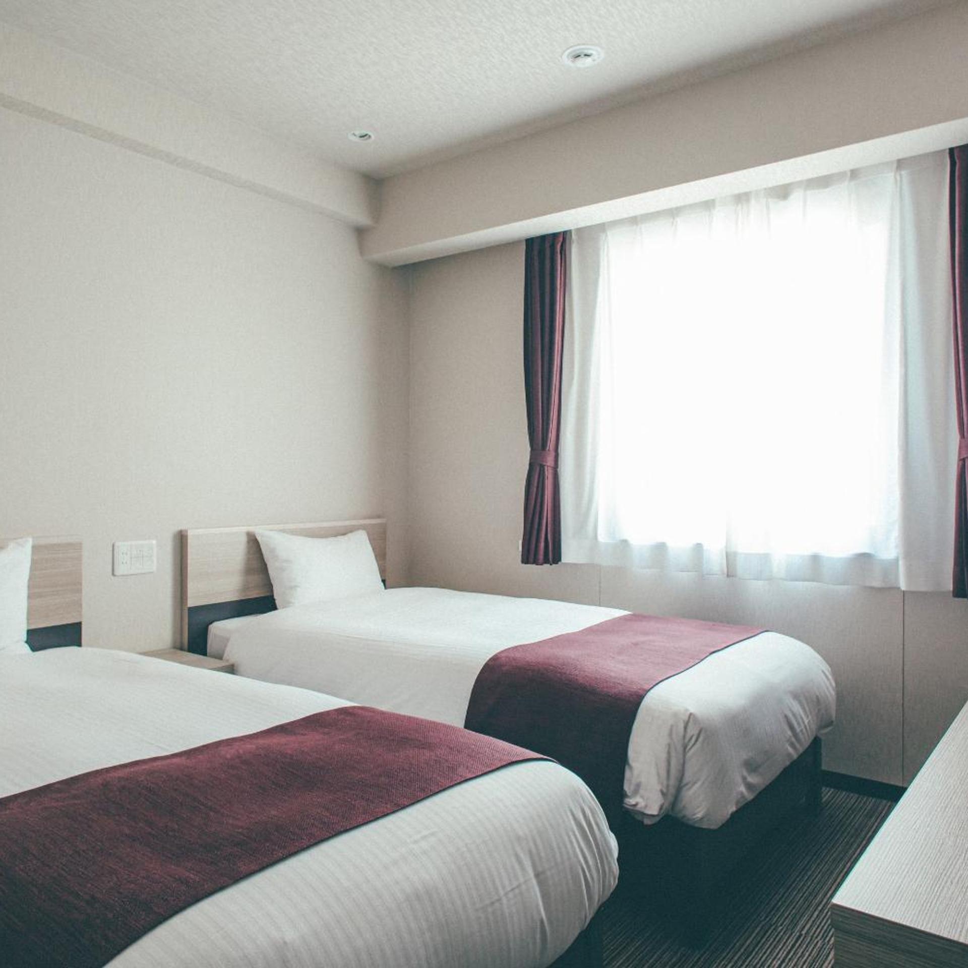 غرفة اقتصادية بسريرين منفصلين