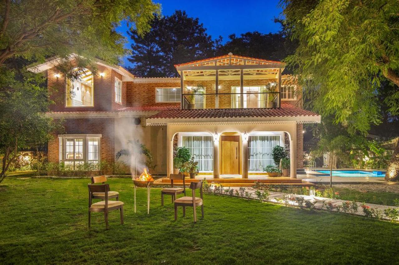 ELIVAAS Varsha Greens A 4-BHK Retreat with Private Pool & Outdoor Patios in Taoru