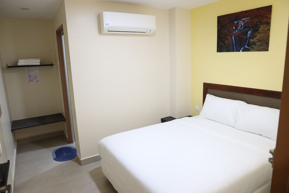 Capital O 90897 Island City Hotel 23/50