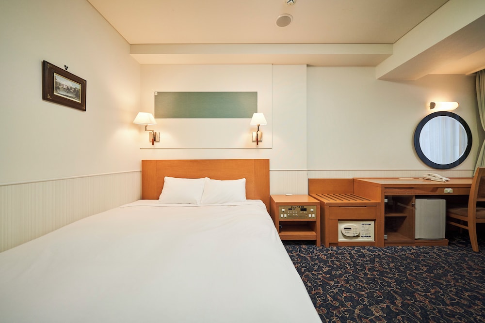 غرفة بسرير كوين بإطلالة على النهر بجاكوزي في الملحق، Hotel Global View Kushiro 2/7