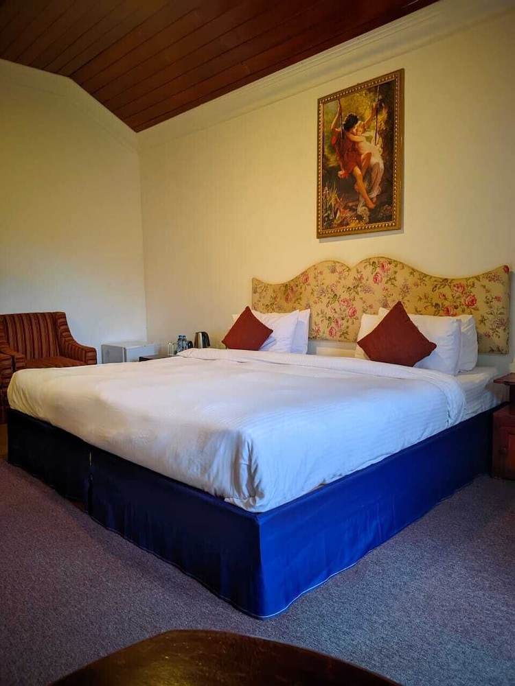 1 Bedroom, Standard, Triple, 1 King and 1 Single Beds, Courtyard View, Courtyard Area