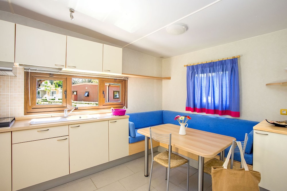 Camping Village Baia Azzurra 57/71