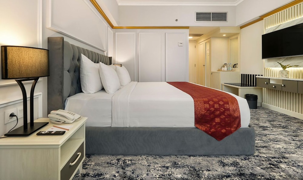 غرفة ديلوكس بسرير كينج، Hotel Pangeran Pekanbaru 6/7