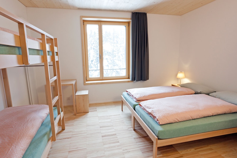 غرفة رباعية بأسرّة بطابقين بحمام خاص