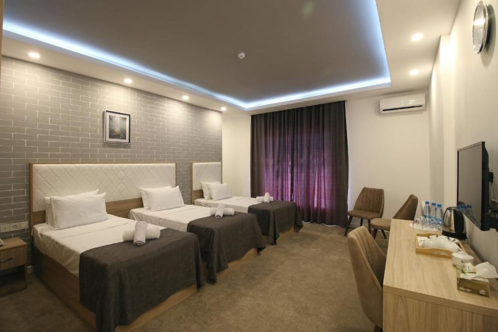 غرفة عائلية بثلاثة أسرّة، Zamzam Hotel 1/4