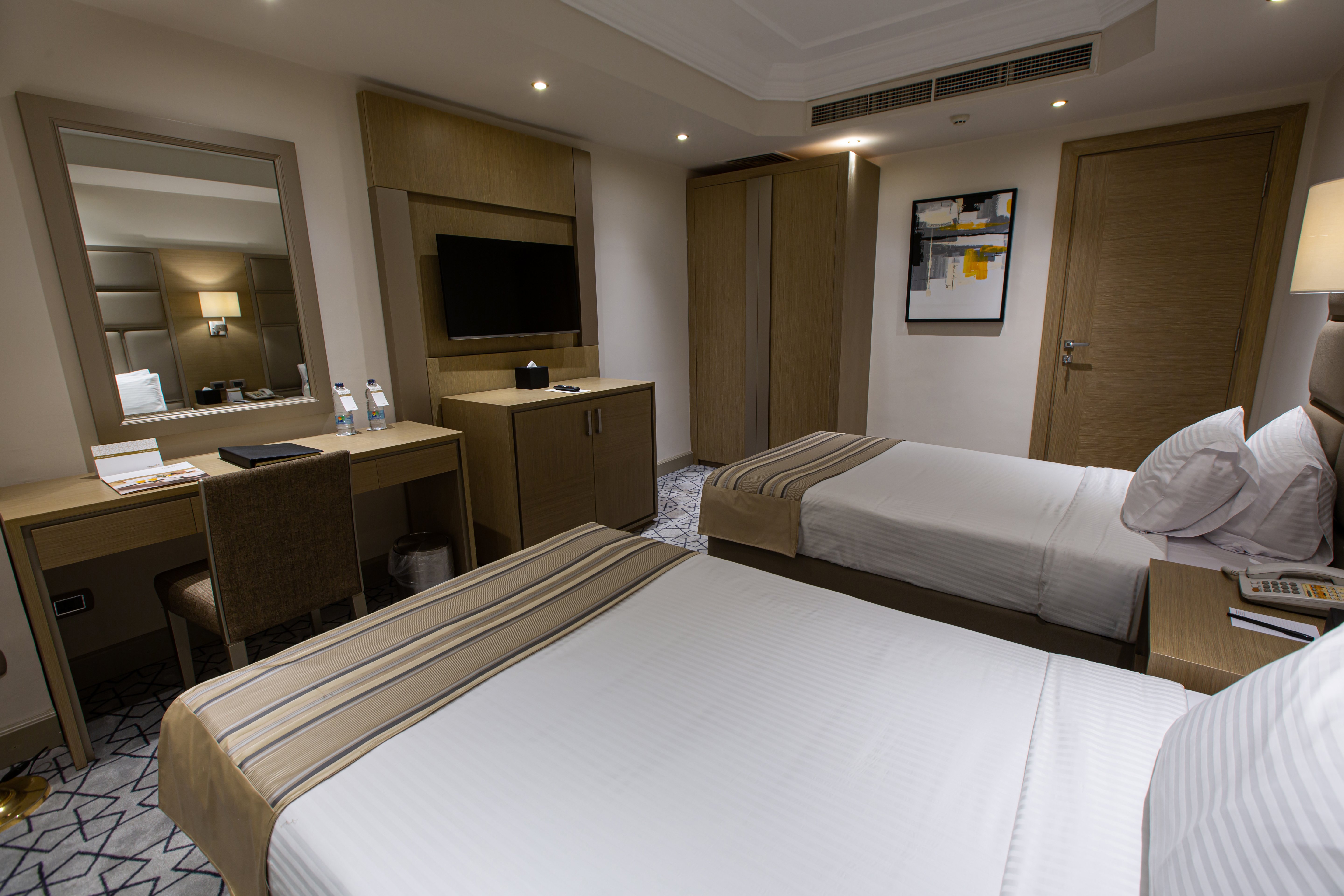 Triumph Plaza Hotel 24/65