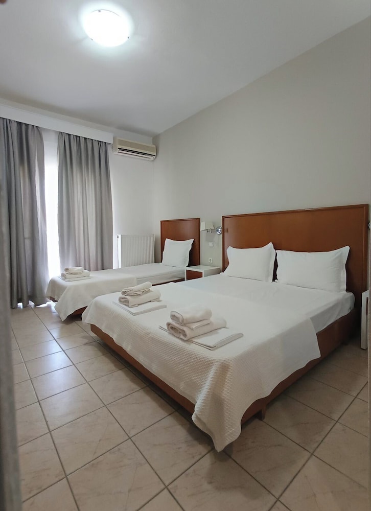 Standard, Triple, 1 Single and 2 Double Beds