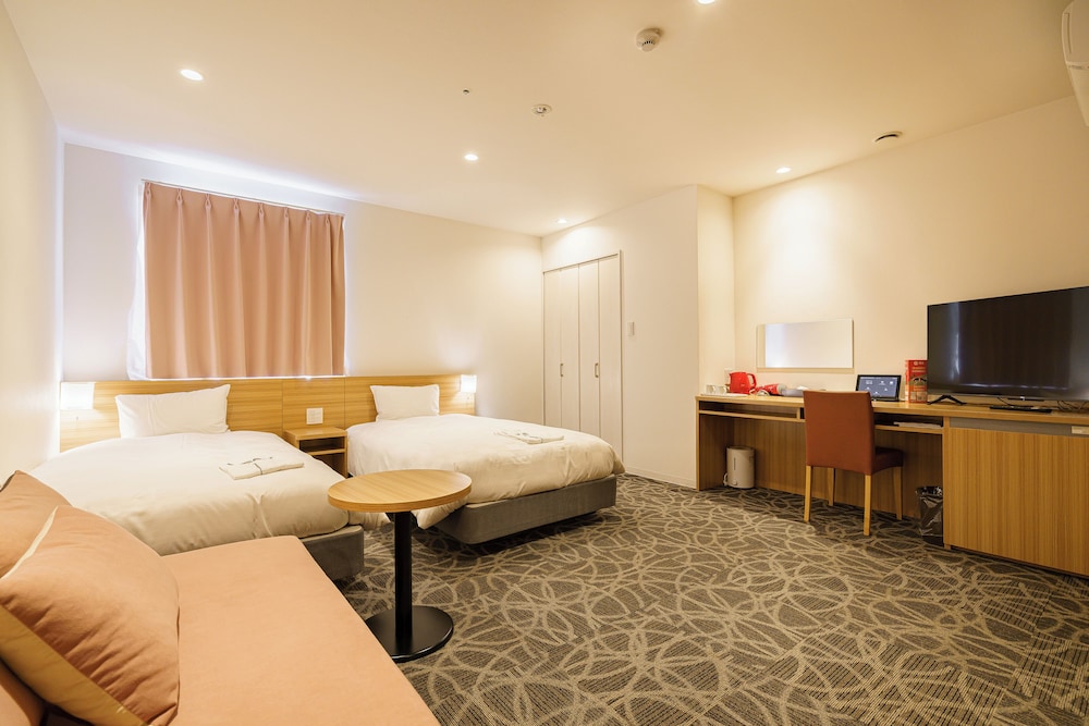 غرفة ديلوكس بسريرين منفصلين مع أريكة، Sakura Garden Hotel 5/10