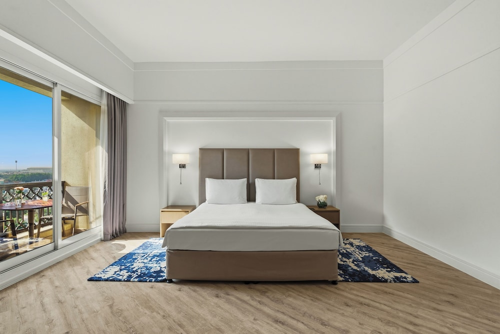 غرفة بريميوم بسرير كينج بإطلالة على الحديقة، Rixos Bab Al Bahr 2/9