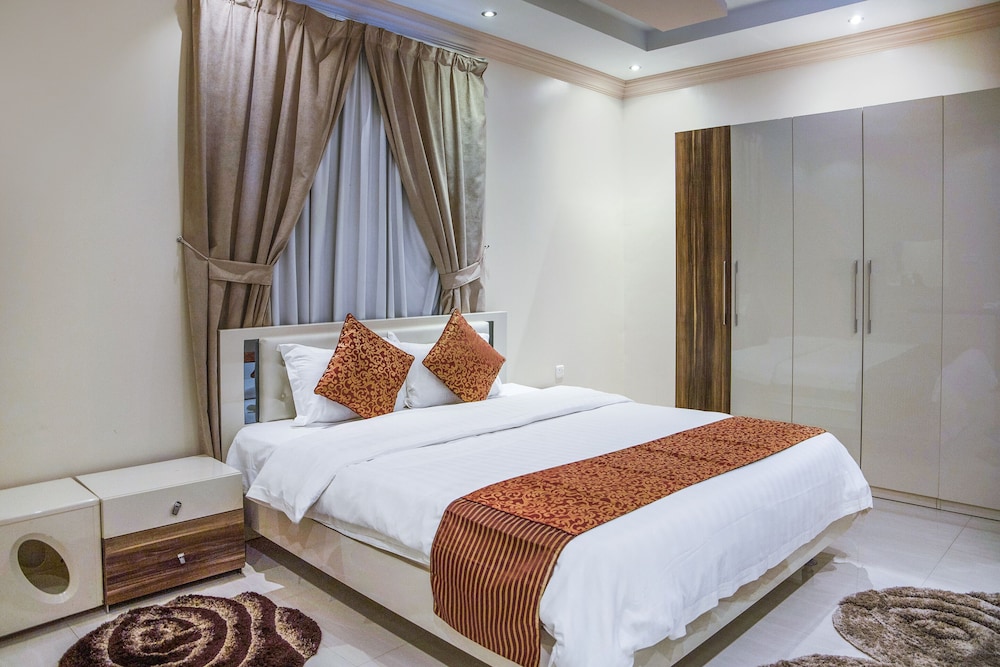 شقة بسرير كينج وسريرين منفصلين بغرفتي نوم، اويو 628 اجنحة وسن(OYO 628 Wasan Suites) 4/7