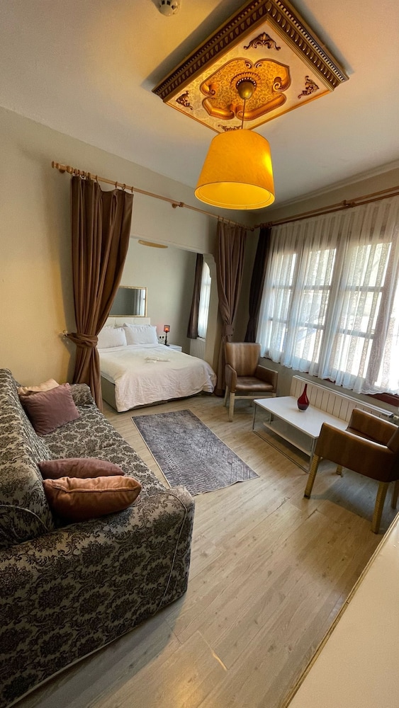 غرفة عائلية رباعية بسرير كوين وأسرّة بطابقين مع أريكة، Chez Bore Boutique Hotel 3/10