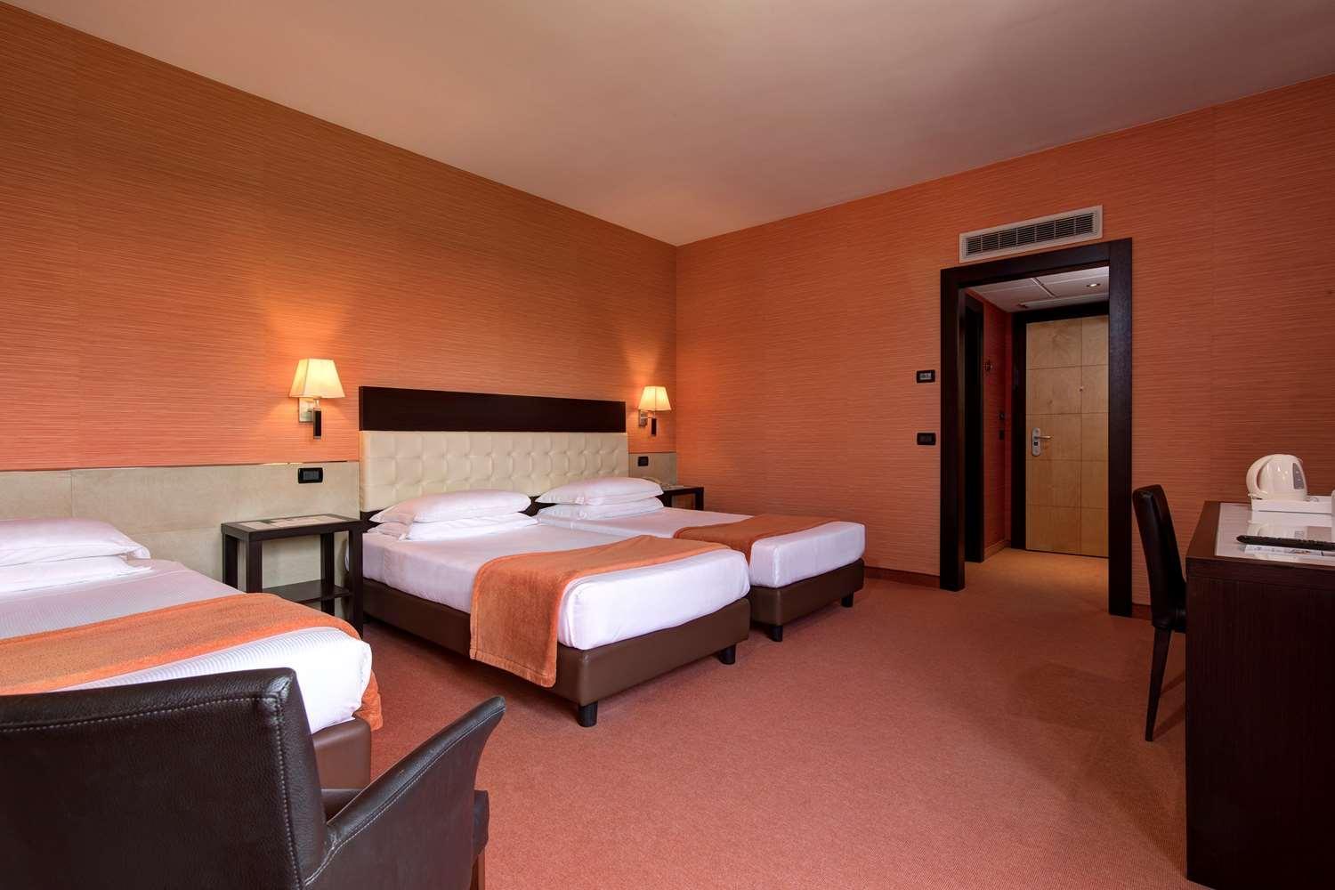 غرفة ثلاثية بسرير كينج وسرير فردي، Best Western Gorizia Palace Hotel 3/8