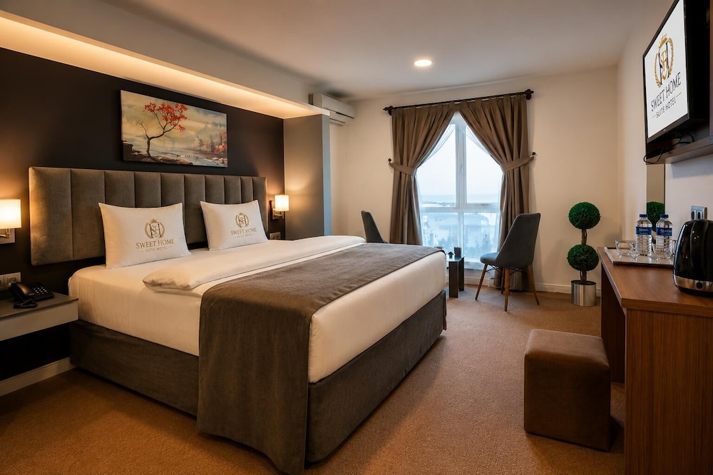 غرفة ملكية بسرير كوين بإطلالة على الحديقة، Sweet Home Suite Hotel 5/8