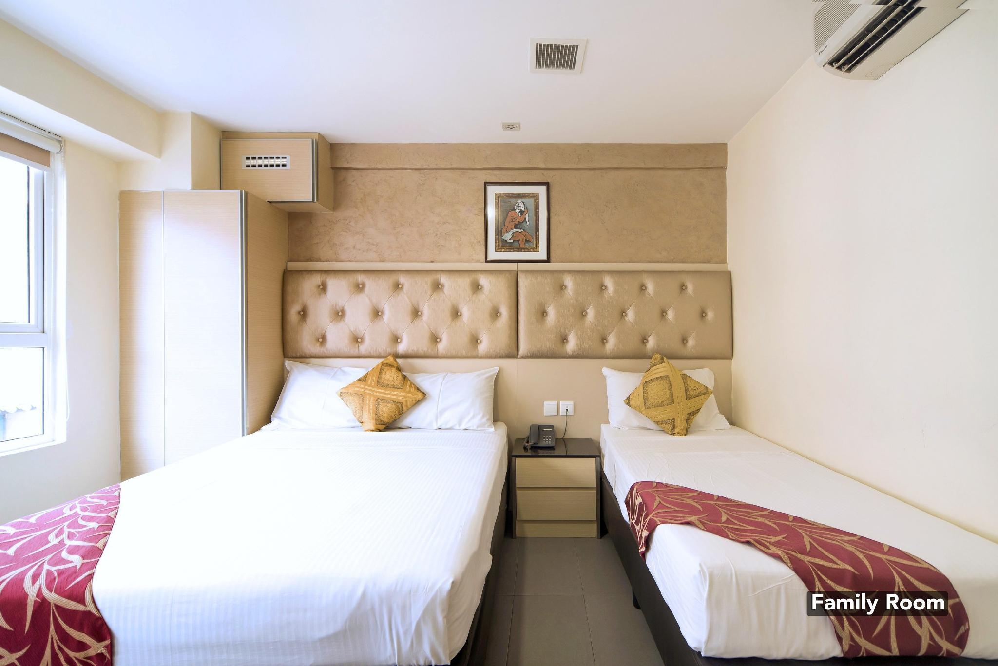 غرفة ديلوكس عائلية بسرير مزدوج وسرير فردي، Sandpiper Hotel 2/2