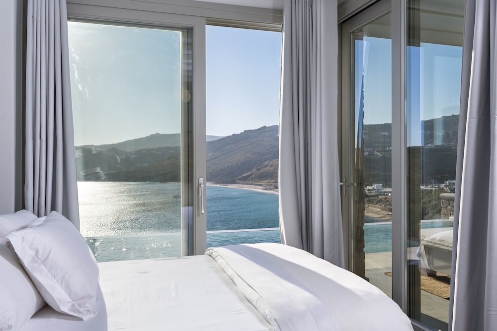 جناح ديلوكس بسرير مزدوج بإطلالة على البحر بمسبح خاص، Smy Mykonos Suites Villas 3/9
