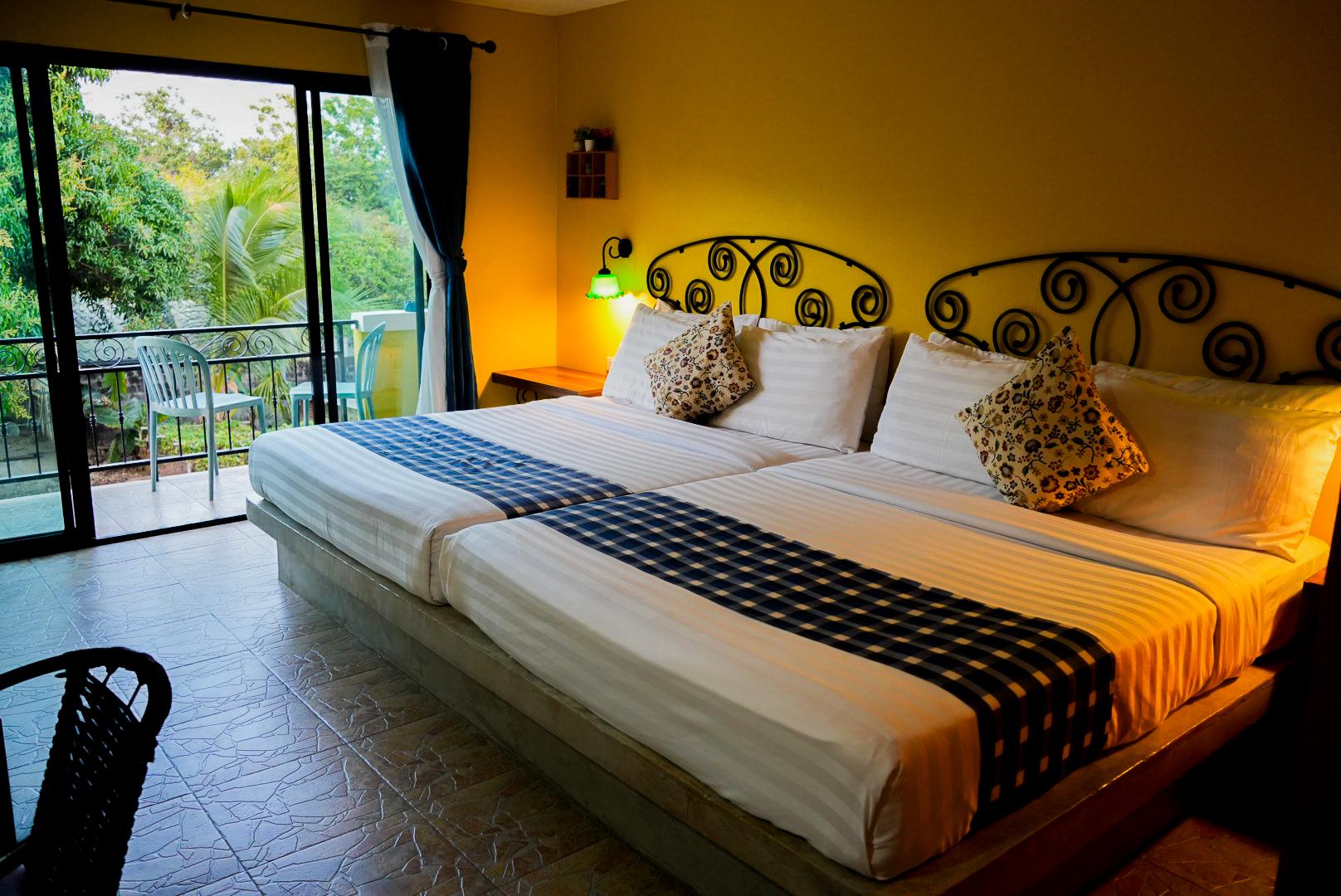 غرفة ديلوكس بسريرين كوين بشرفة