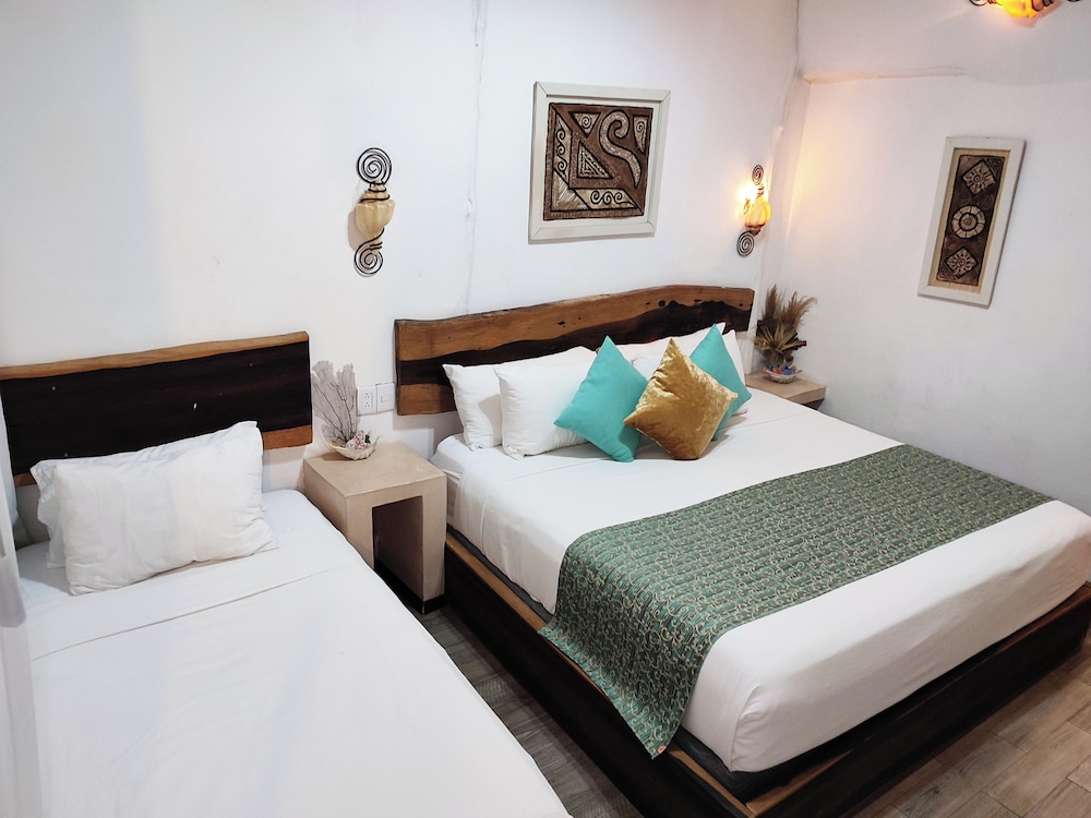 جناح جونيور بسرير كينج وسرير فردي بإطلالة على الحديقة، Villa Las Estrellas 3/4